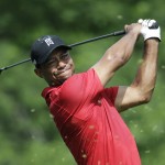 
              Tiger Woods tees off on the 18th hole during the final round of the Memorial golf tournament Sunday, June 7, 2015, in Dublin, Ohio. (AP Photo/Darron Cummings)
            