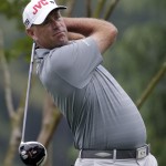 
              Stewart Cink watches his tee shot on the 11th hole during the second round of the Wells Fargo Championship golf tournament at Quail Hollow Club in Charlotte, N.C., Friday, May 15, 2015. (AP Photo/Chuck Burton)
            