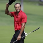 
              Tiger Woods acknowledges the crowd following his final round of the Memorial golf tournament Sunday, June 7, 2015, in Dublin, Ohio. (AP Photo/Darron Cummings)
            
