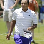 
              Fabian Gomez, of Argentina, walks off the ninth green at the end of his second round of the St. Jude Classic golf tournament Friday, June 12, 2015, in Memphis, Tenn. Gomez finished with a two-day score of  6-under par, 134. (AP Photo/Mark Humphrey)
            