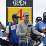 
              United States’ Jordan Spieth, center, and his caddie check the yardage book on the fourth tee during a practice round at the British Open Golf Championship at the Old Course, St. Andrews, Scotland, Tuesday, July 14, 2015. (AP Photo/Jon Super)
            