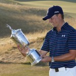 
              Jordan Spieth looks at the trophy after winning the final round of the U.S. Open golf tournament at Chambers Bay on Sunday, June 21, 2015 in University Place, Wash. (AP Photo/Matt York)
            