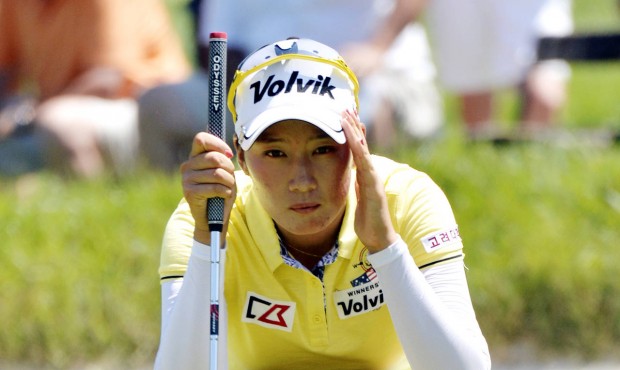 n Chella Choi of South Korea lines up her putt on the 14th green during the third round of the U.S....