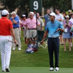 
              Tiger Woods, right, chats with Jason Day on the ninth green during a practice round for The Players Championship golf tournament in Ponte Vedra Beach, Fla., Tuesday, May 5, 2015.   (William Dickey/The Florida Times-Union via AP)
            