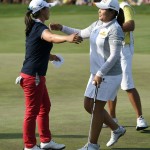 
              Inbee Park of South Korea, right, embraces Sei Young Kim of South Korea after Park won the KPMG Women's PGA golf championship at Westchester Country Club on Sunday, June 14, 2015, in Harrison, N.Y. Kim came in second place. (AP Photo/Kathy Kmonicek)
            