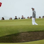 
              United States’ Rickie Fowler walks next to a bunker on the 11th hole during a practice round at the British Open Golf Championship at the Old Course, St. Andrews, Scotland, Tuesday, July 14, 2015. (AP Photo/Peter Morrison)
            