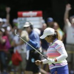 
              Lizette Salas and fans react after her approach shot for a bogey on the tenth hole during the final round of the Meijer LPGA Classic golf tournament Sunday, July 26, 2015, in Belmont, Mich. (AP Photo/Carlos Osorio)
            