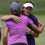 
              Gwladys Nocera, right, of France, and Paula Reto, of South Africa, exchange a hug after they finished their round of golf during the KPMG Women's PGA golf championship at Westchester Country Club, Thursday, June 11, 2015, in Harrison, N.Y. (AP Photo/Julio Cortez)
            