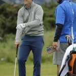 
              United States’ Jordan Spieth, left, laughs on the putting green during a practice round at the British Open Golf Championship at the Old Course, St. Andrews, Scotland, Tuesday, July 14, 2015. (AP Photo/David J. Phillip)
            