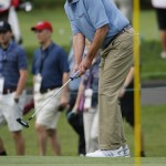 
              Kentucky Gov. Steve Beshear watches his putt on the 10th hole during the pro-am for the Greenbrier Classic golf tournament at the Greenbrier Resort in White Sulphur Springs, WV., Wednesday, July 1, 2015.  (AP Photo/Steve Helber)
            