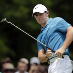 
              Rory McIlroy, of Northern Ireland, reacts as he misses a putt on the second hole during the final round of the Wells Fargo Championship golf tournament at Quail Hollow Club in Charlotte, N.C., Sunday, May 17, 2015. (AP Photo/Chuck Burton)
            
