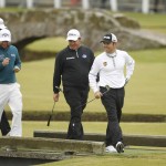 
              South Africa's George Coetzee, centre, Louis Oosthuizen, right, and Branden Grace walk towards the 1st green during a practice round  at the Old Course, St Andrews, Scotland, Monday, July 13, 2015. The  2015 Open Golf Championship that is due to take place at St. Andrews July16-19.  (AP Photo/Peter Morrison)
            