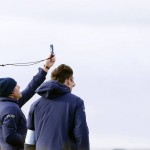 
              Officials measure the wind speed on the 12th hole as play is suspended during the second round of the British Open Golf Championship at the Old Course, St. Andrews, Scotland, Saturday, July 18, 2015. Play was suspended on Saturday as high winds caused players golf balls to move on some greens in the high winds.  (AP Photo/Alastair Grant)
            