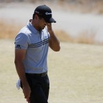 
              Jason Day, of Australia, wipes his face on the third green during the third round of the U.S. Open golf tournament at Chambers Bay on Saturday, June 20, 2015 in University Place, Wash. (AP Photo/Matt York)
            