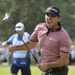 
              Jason Day celebrates after sinking a birdie putt on the 18th during final-round action at the Canadian Open golf tournament in Oakville, Ontario, Sunday, July 26, 2015. Day won the tournament. (Paul Chiasson/The Canadian Press via AP) MANDATORY CREDIT
            