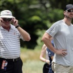 
              Former St. Louis Cardinals pitcher Chris Carpenter, right, watches action on the fourth hole during the third round of the St. Jude Classic golf tournament Saturday, June 13, 2015, in Memphis, Tenn. (AP Photo/Mark Humphrey)
            