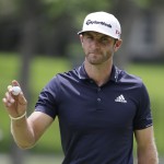 
              Dustin Johnson reacts after making a birdie on the second hold during the final round of the Memorial golf tournament Sunday, June 7, 2015, in Dublin, Ohio. (AP Photo/Darron Cummings)
            
