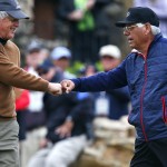 
              Mike Hill, left, congratulates partner Lee Trevino after Trevino sunk a difficult putt in the ninth hole during the Champions Tour's Bass Pro Shops Legends of Golf tournament at the Top of the Rock golf course in Ridgedale, Mo., Friday, April 24, 2015. (Guillermo Hernandez Martinez/The Springfield News-Leader via AP) NO SALES
            