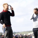 
              Denmark's Soren Kjeldsen, left, reacts, as Bernd Wiesberger of Austria, right, looks on after Soren won the Irish Open Golf Championship at Royal County Down, Newcastle, Northern Ireland, Sunday, May 31, 2015.  (AP Photo/Peter Morrison)
            