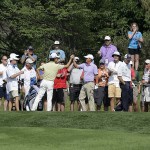 
              Jason Dufner, center right, celebrates with Kevin Na, after Dufner hit a hole-in-one on the 16th hole during the second round of the Memorial golf tournament, Friday, June 5, 2015, in Dublin, Ohio. (AP Photo/Darron Cummings)
            