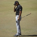 
              Jason Day, of Australia, reacts to his putt on the fourth hole during the final round of the U.S. Open golf tournament at Chambers Bay on Sunday, June 21, 2015 in University Place, Wash. (AP Photo/Ted S. Warren)
            