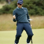 
              England’s Justin Rose reacts after a birdie on the fourth green during the first round of the British Open Golf Championship at the Old Course, St. Andrews, Scotland, Thursday, July 16, 2015. (AP Photo/Jon Super)
            