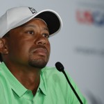 
              Tiger Woods talks speaks to the media during a news conference for the U.S. Open golf tournament at Chambers Bay on Tuesday, June 16, 2015 in University Place, Wash. (AP Photo/John Locher)
            
