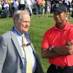 
              FILE - In this June 3, 2012, file photo, Jack Nicklaus, left, and Tiger Woods talk after Woods won the Memorial golf tournament at the Muirfield Village Golf Club in Dublin, Ohio. Nicklaus gets asked more about Tiger Woods than he ever did about the golf ball. Only now, the nature of the question has changed dramatically. It has gone from "Do you think Tiger will break your record?" to "What's wrong with Tiger?" The answer is the same. Nicklaus doesn't know. Woods might not, either. (AP Photo/Tony Dejak, File)
            