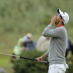 
              Australia’s Adam Scott reacts after missing a birdie shot on the 14th green during the second round of the British Open Golf Championship at the Old Course, St. Andrews, Scotland, Friday, July 17, 2015. (AP Photo/David J. Phillip)
            