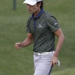 
              Kevin Na pumps his fist after making a birdie putt on the ninth hole during the first round of The Players Championship golf tournament Thursday, May 7, 2015, in Ponte Vedra Beach, Fla. (AP Photo/Lynne Sladky)
            