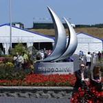 
              Visitors sit near to a statue of the U.S. Open Championship logo at the Chambers Bay golf course in University Place, Wash., Thursday, June 11, 2015. Chambers Bay will host the U.S. Open Championship next week, but the merchandise store and some other non-course areas are open to the public through this weekend. (AP Photo/Ted S. Warren)
            