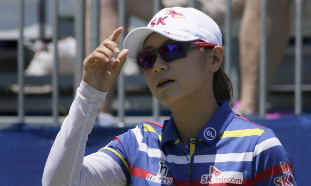 Na Yeon Choi, of South Korea, looks down the first fairway before hitting her tee shot during the f...