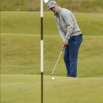 
              United States’ Jordan Spieth putts to the second green during a practice round at the British Open Golf Championship at the Old Course, St. Andrews, Scotland, Tuesday, July 14, 2015. (AP Photo/Jon Super)
            