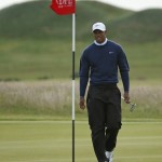 
              United States’ Tiger Woods walks on the 13th green during the second round of the British Open Golf Championship at the Old Course, St. Andrews, Scotland, Saturday, July 18, 2015. (AP Photo/Jon Super)
            