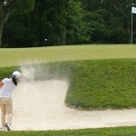 
              Sei Young Kim, of South Korea, hits out of a bunker onto the 10th green during the second round of the KPMG Women's PGA golf championship at Westchester Country Club, Friday, June 12, 2015, in Harrison, N.Y.  (AP Photo/Adam Hunger)
            