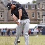 
              Australia’s Jason Day plays from the second tee during the third round of the British Open Golf Championship at the Old Course, St. Andrews, Scotland, Sunday, July 19, 2015. (AP Photo/Alastair Grant)
            