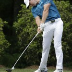 
              Rory McIlroy, of Northern Ireland, hits his tee shot on the fifth hole during the final round of the Wells Fargo Championship golf tournament at Quail Hollow Club in Charlotte, N.C., Sunday, May 17, 2015. (AP Photo/Chuck Burton)
            