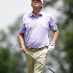 
              Jason Dufner watches his shot onto the ninth green during the second round of the Memorial golf tournament, Friday, June 5, 2015, in Dublin, Ohio. (AP Photo/Darron Cummings)
            