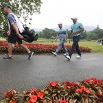 
              Tiger Woods, center right, walks with David Lingmerth, of Sweden, to the 16th green during the first round of the Greenbrier Classic golf tournament at the Greenbrier Resort  in White Sulphur Springs, W.Va., Thursday, July 2, 2015.  (AP Photo/Steve Helber)
            