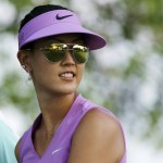 
              Michelle Wie walks from the tee box on the first hole in the first round of the NW Arkansas Championship LPGA golf tournament at Pinnacle Country Club in Rogers, Ark., Friday, June 26, 2015. (AP Photo/Danny Johnston)
            