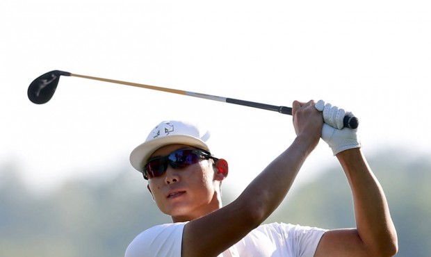 Whee Kim, of South Korea, watches his tee shot on the ninth hole during the second round of the Bar...
