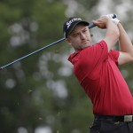 
              Russell Knox watches his tee shot on the 17th hole during the second round of the Wells Fargo Championship golf tournament at Quail Hollow Club in Charlotte, N.C., Friday, May 15, 2015. (AP Photo/Chuck Burton)
            