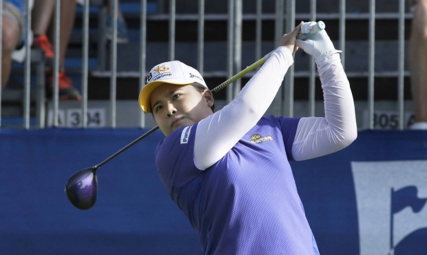 Inbee Park, of South Korea, watches her opening tee shot in the first round of the NW Arkansas Cham...