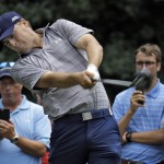 
              Jordan Spieth hits his tee shot on the 15th hole during a practice round at The Players Championship golf tournament Wednesday, May 6, 2015, in Ponte Vedra Beach, Fla. (AP Photo/Chris O'Meara)
            
