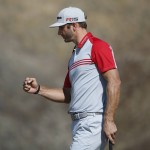 
              Dustin Johnson reacts after making a birdie on the ninth hole during the third round of the U.S. Open golf tournament at Chambers Bay on Saturday, June 20, 2015 in University Place, Wash. (AP Photo/Lenny Ignelzi)
            