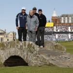 
              From left, Scotland’s Paul Lawrie, United States’ Arnold Palmer, Northern Ireland’s Darren Clarke and United States’ Bill Rogers pose for a photograph on Swilcan Bridge during a special Champion Golfers' challenge at the British Open Golf Championship at the Old Course, St. Andrews, Scotland, Wednesday, July 15, 2015. (AP Photo/Jon Super)
            