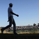 
              Dustin Johnson walks to the 13th green during the final round of the U.S. Open golf tournament at Chambers Bay on Sunday, June 21, 2015 in University Place, Wash. (AP Photo/Charlie Riedel)
            
