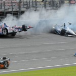 
              Takuma Sato (14) goes airborne after colliding with Will Power, top right, during the closing laps Saturday June 27, 2015 during the IndyCar auto race at Auto Club Speedway in Fontana, Calif. (AP Photo/Will Lester)
            