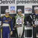 
              Marco Andretti, left, Carlos Munoz of Colombia, center, and Simon Pagenaud of France hold their winners trophies after the first race of the IndyCar Detroit Grand Prix auto racing doubleheader Saturday, May 30, 2015, in Detroit. Munoz won his first IndyCar race in the rain shortened event. (AP Photo/Carlos Osorio)
            