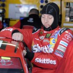
              Kyle Busch climbs into his car before practice for Sunday's NASCAR Coca-Cola 600 Sprint Cup series auto race at Charlotte Motor Speedway in Concord, N.C., Thursday, May 21, 2015. (AP Photo/Mike McCarn)
            